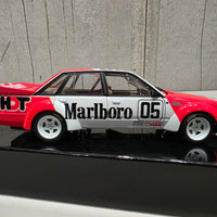 PETER BROCK - LARRY PERKINS - HOLDEN DEALER TEAM - VK COMMODORE - 1984 BATHURST WINNER - 1:18 SCALE DIECAST WITH HELMET - BIANTE
