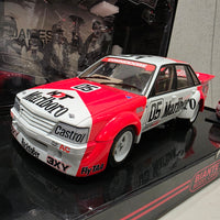 PETER BROCK - LARRY PERKINS - HOLDEN DEALER TEAM - VK COMMODORE - 1984 BATHURST WINNER - 1:18 SCALE DIECAST WITH HELMET - BIANTE