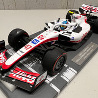 HAAS F1 TEAM VF-22 - MICK SCHUMACHER - FIRST POINTS - BRITISH GP 2022 - 1:18 Scale Resin Model Car - Minichamps