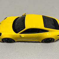 PORSCHE 911 (992) GT3 TOURING - 2022 - YELLOW W/BLACK WHEELS - 1:18 Scale Resin Model Car - Minichamps