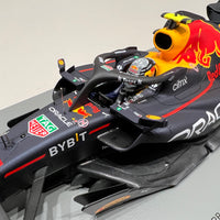 Oracle Red Bull Racing RB18 No.11 Oracle Red Bull Racing - Winner Monaco GP 2022 - Sergio Pérez. With Acrylic Cover - 1:18 Scale Resin Model Car