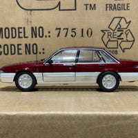 HOLDEN VL CALAIS - RED/SILVER - 1:24 SCALE DIECAST MODEL - DDA