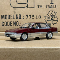 HOLDEN VL CALAIS - RED/SILVER - 1:24 SCALE DIECAST MODEL - DDA