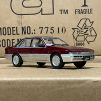 HOLDEN VL CALAIS - RED/SILVER - 1:24 SCALE DIECAST MODEL - DDA
