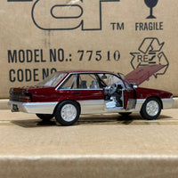 HOLDEN VL CALAIS - RED/SILVER - 1:24 SCALE DIECAST MODEL - DDA