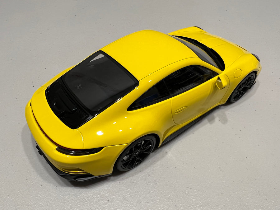 PORSCHE 911 (992) GT3 TOURING - 2022 - YELLOW W/BLACK WHEELS - 1:18 Scale Resin Model Car - Minichamps