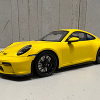 PORSCHE 911 (992) GT3 TOURING - 2022 - YELLOW W/BLACK WHEELS - 1:18 Scale Resin Model Car - Minichamps