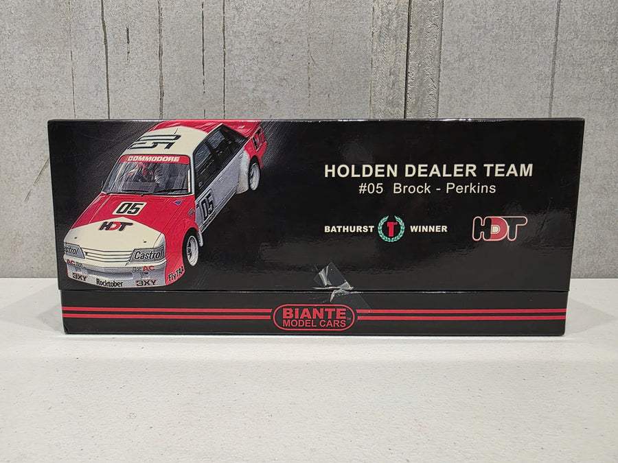 PETER BROCK - LARRY PERKINS - HOLDEN DEALER TEAM - VK COMMODORE - 1984 BATHURST WINNER - 1:18 SCALE DIECAST WITH HELMET - BIANTE