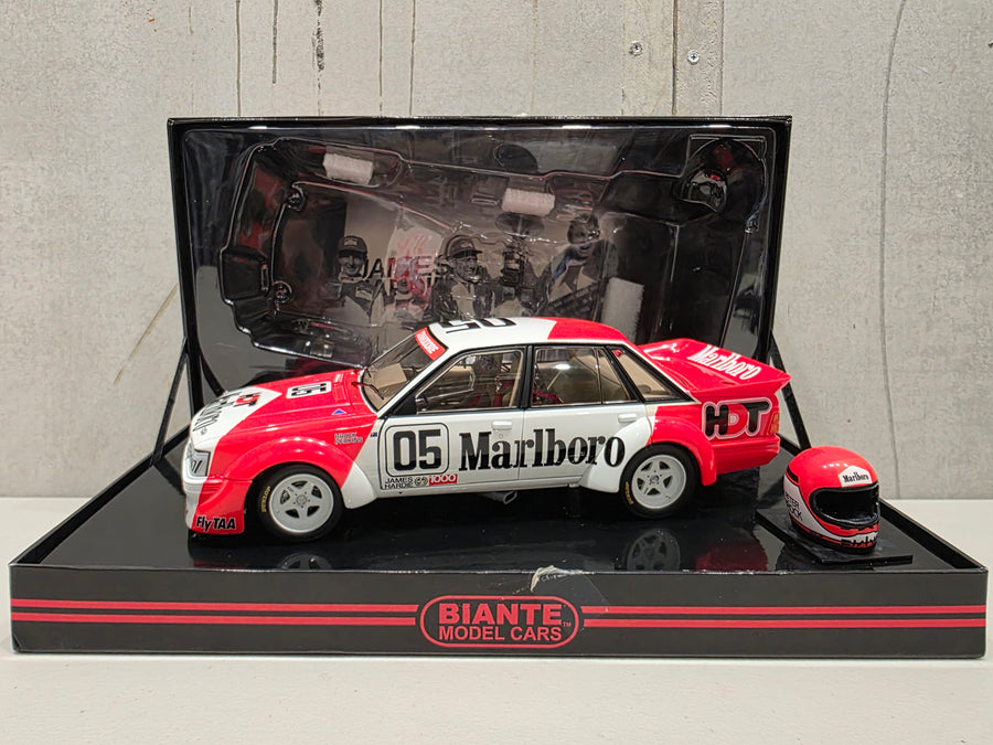 PETER BROCK - LARRY PERKINS - HOLDEN DEALER TEAM - VK COMMODORE - 1984 BATHURST WINNER - 1:18 SCALE DIECAST WITH HELMET - BIANTE