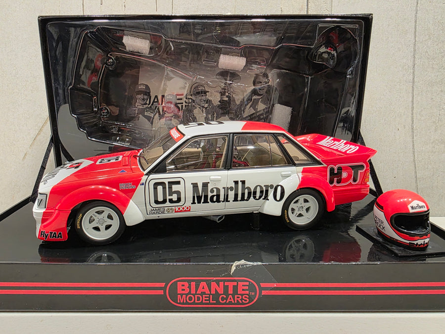 PETER BROCK - LARRY PERKINS - HOLDEN DEALER TEAM - VK COMMODORE - 1984 BATHURST WINNER - 1:18 SCALE DIECAST WITH HELMET - BIANTE