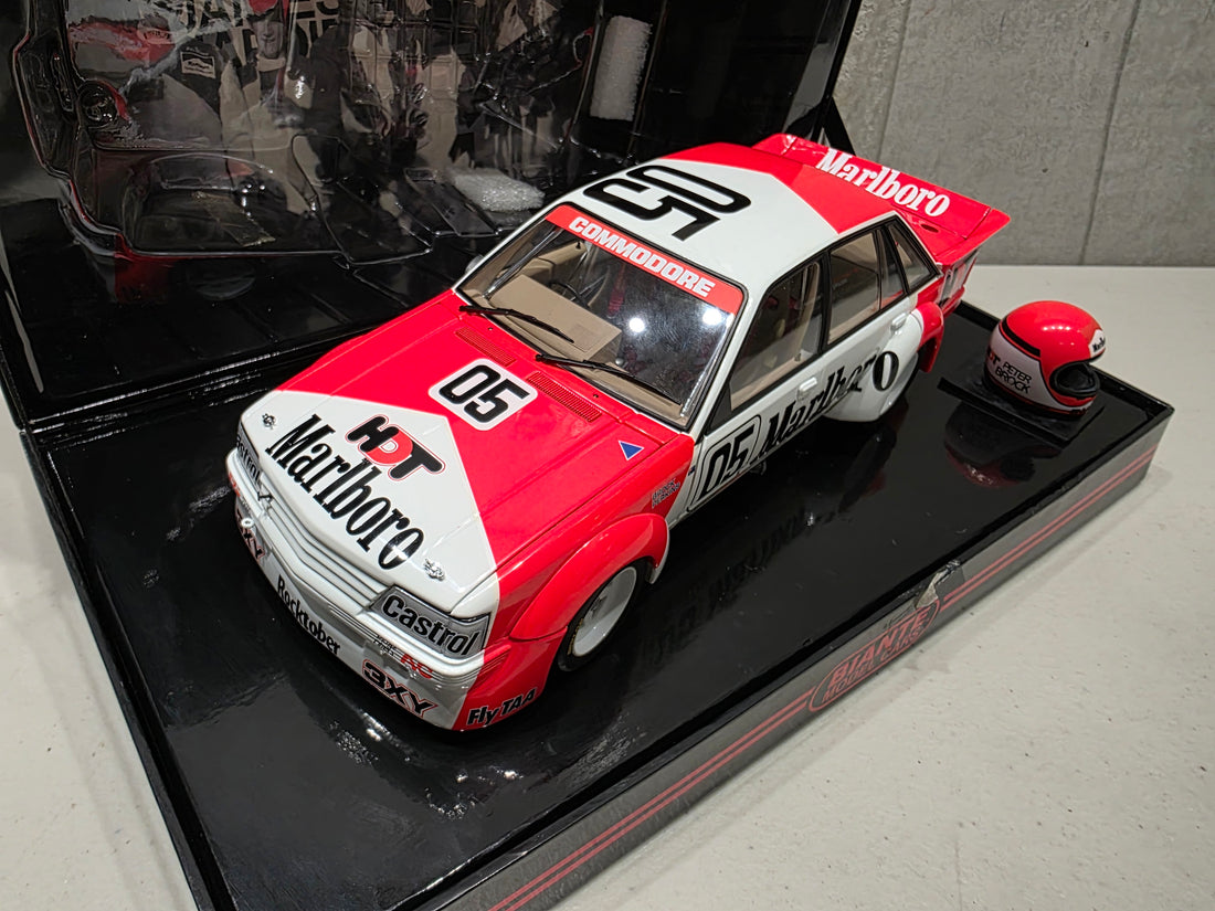 PETER BROCK - LARRY PERKINS - HOLDEN DEALER TEAM - VK COMMODORE - 1984 BATHURST WINNER - 1:18 SCALE DIECAST WITH HELMET - BIANTE