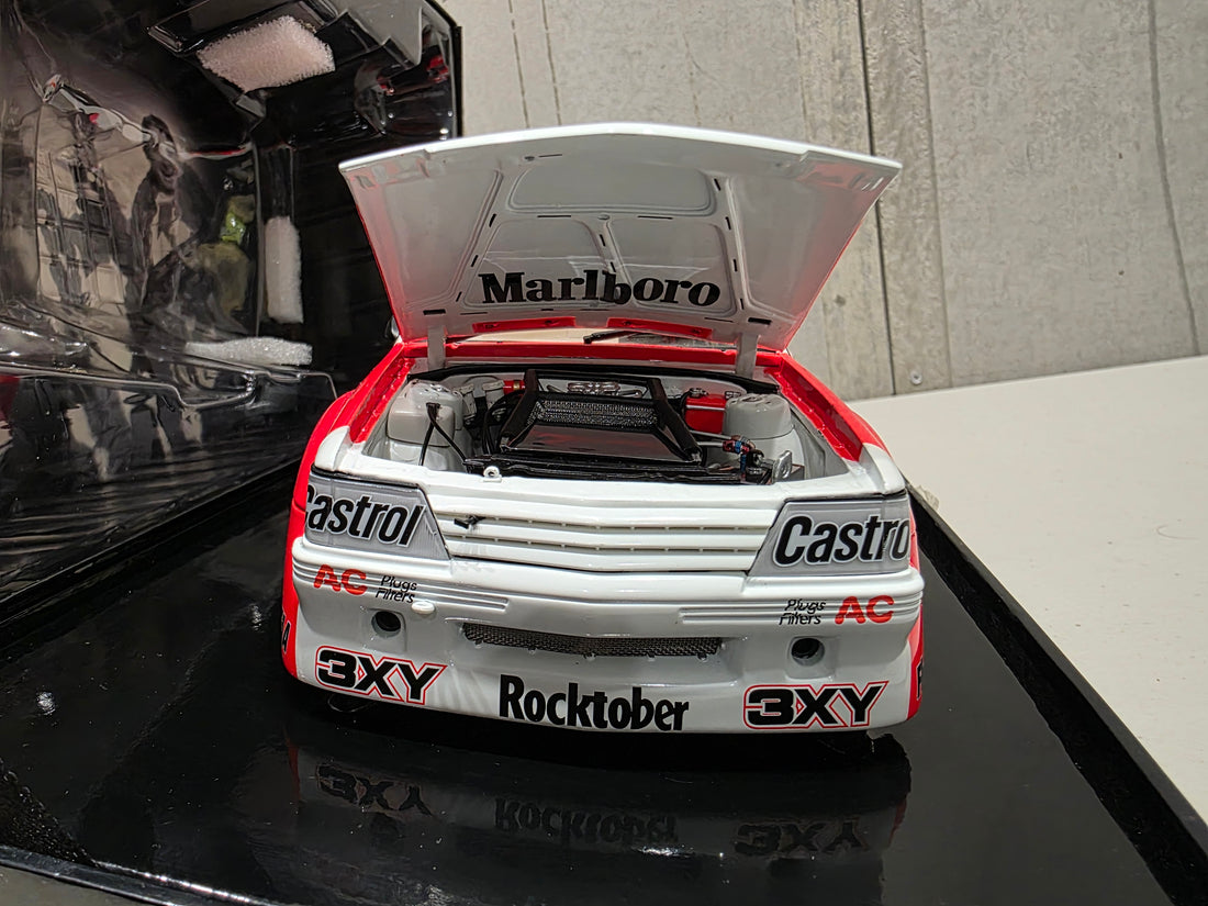 PETER BROCK - LARRY PERKINS - HOLDEN DEALER TEAM - VK COMMODORE - 1984 BATHURST WINNER - 1:18 SCALE DIECAST WITH HELMET - BIANTE