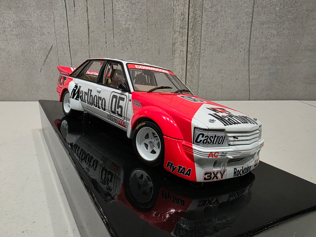 PETER BROCK - LARRY PERKINS - HOLDEN DEALER TEAM - VK COMMODORE - 1984 BATHURST WINNER - 1:18 SCALE DIECAST WITH HELMET - BIANTE