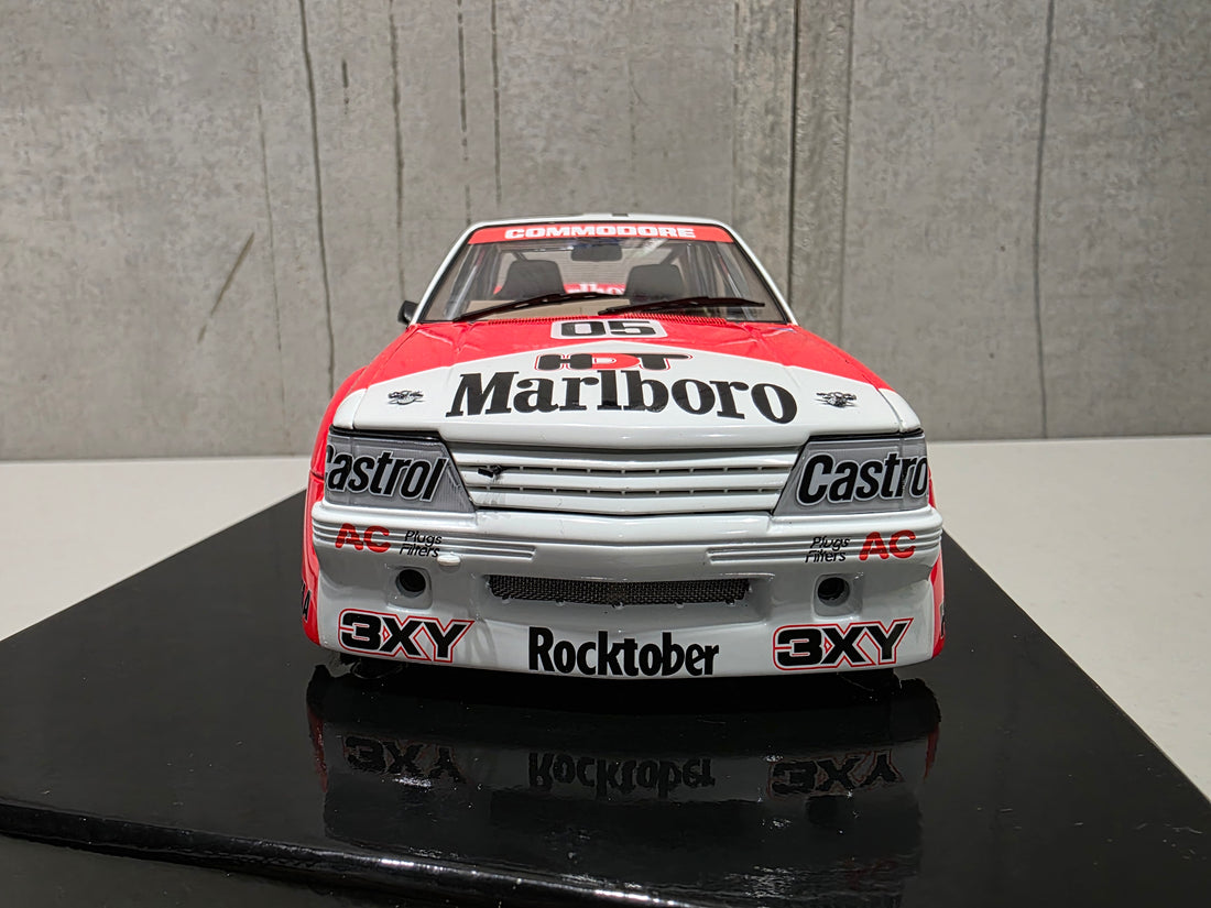 PETER BROCK - LARRY PERKINS - HOLDEN DEALER TEAM - VK COMMODORE - 1984 BATHURST WINNER - 1:18 SCALE DIECAST WITH HELMET - BIANTE