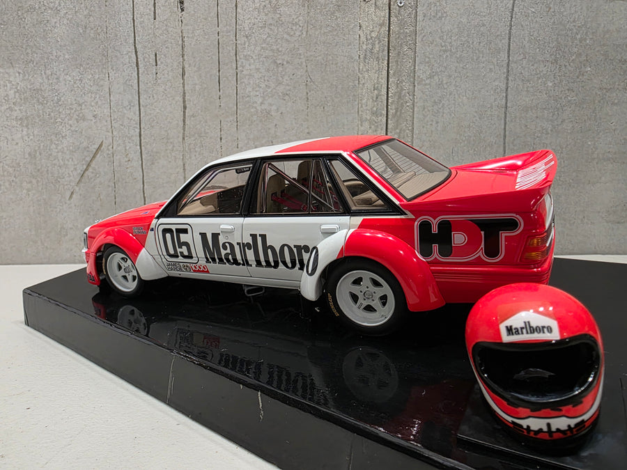 PETER BROCK - LARRY PERKINS - HOLDEN DEALER TEAM - VK COMMODORE - 1984 BATHURST WINNER - 1:18 SCALE DIECAST WITH HELMET - BIANTE
