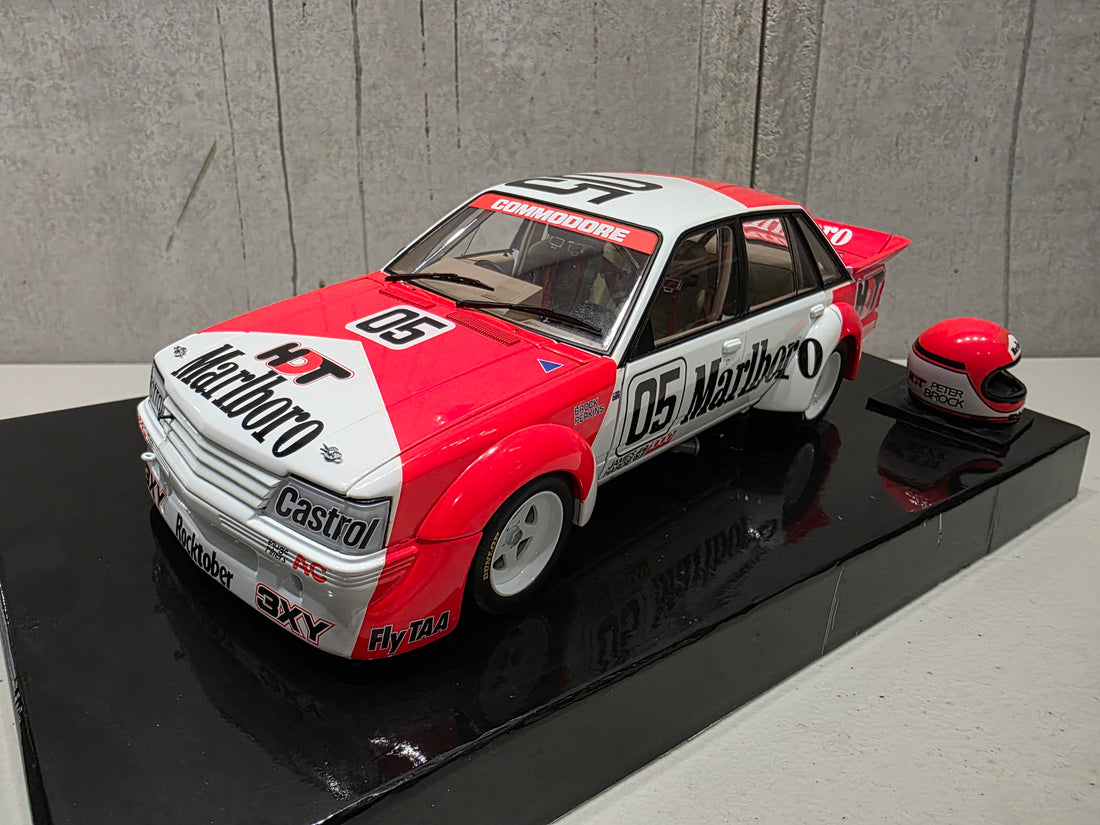 PETER BROCK - LARRY PERKINS - HOLDEN DEALER TEAM - VK COMMODORE - 1984 BATHURST WINNER - 1:18 SCALE DIECAST WITH HELMET - BIANTE
