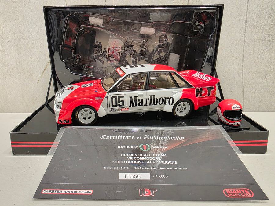 PETER BROCK - LARRY PERKINS - HOLDEN DEALER TEAM - VK COMMODORE - 1984 BATHURST WINNER - 1:18 SCALE DIECAST WITH HELMET - BIANTE