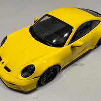 PORSCHE 911 (992) GT3 TOURING - 2022 - YELLOW W/BLACK WHEELS - 1:18 Scale Resin Model Car - Minichamps