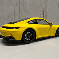 PORSCHE 911 (992) GT3 TOURING - 2022 - YELLOW W/BLACK WHEELS - 1:18 Scale Resin Model Car - Minichamps