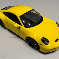 PORSCHE 911 (992) GT3 TOURING - 2022 - YELLOW W/BLACK WHEELS - 1:18 Scale Resin Model Car - Minichamps