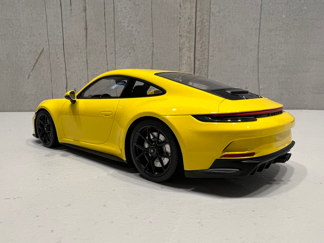 PORSCHE 911 (992) GT3 TOURING - 2022 - YELLOW W/BLACK WHEELS - 1:18 Scale Resin Model Car - Minichamps