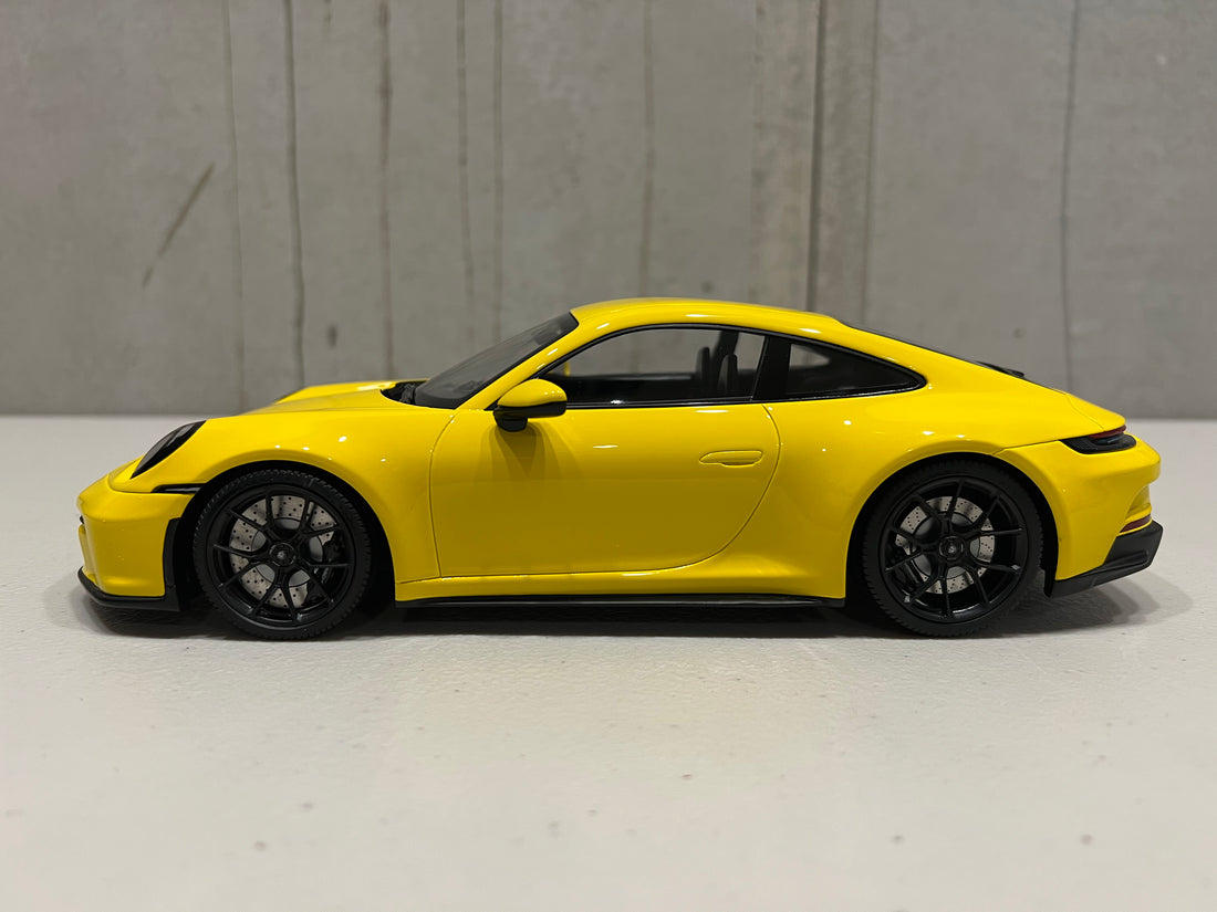 PORSCHE 911 (992) GT3 TOURING - 2022 - YELLOW W/BLACK WHEELS - 1:18 Scale Resin Model Car - Minichamps