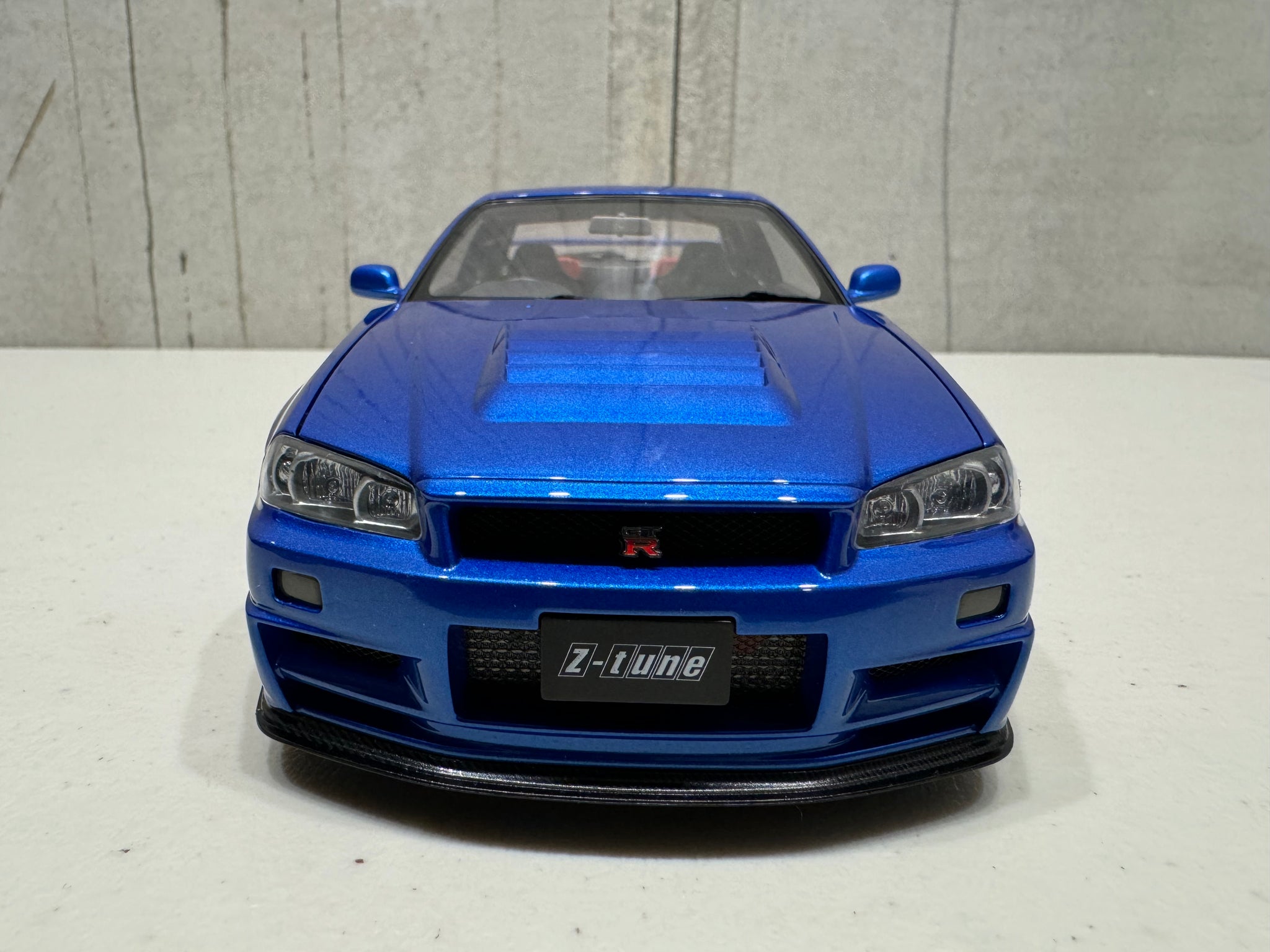 NISSAN SKYLINE R34 GT-R Z-TUNE NISMO (BAYSIDE BLUE) - 1:18 SCALE MODEL