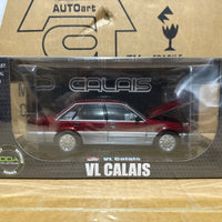 HOLDEN VL CALAIS - RED/SILVER - 1:24 SCALE DIECAST MODEL - DDA