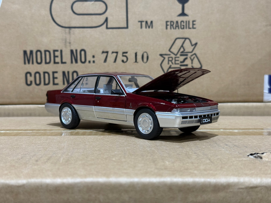 HOLDEN VL CALAIS - RED/SILVER - 1:24 SCALE DIECAST MODEL - DDA