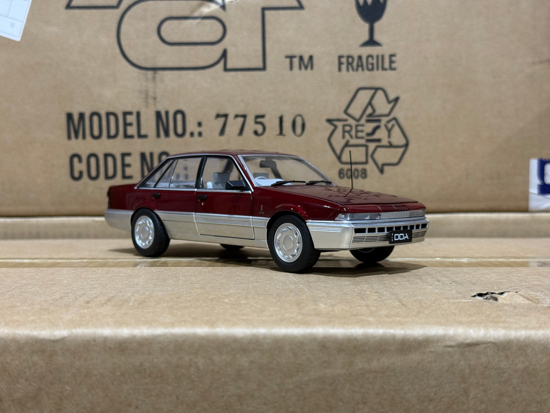 HOLDEN VL CALAIS - RED/SILVER - 1:24 SCALE DIECAST MODEL - DDA