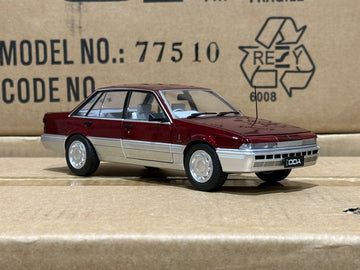 HOLDEN VL CALAIS - RED/SILVER - 1:24 SCALE DIECAST MODEL - DDA